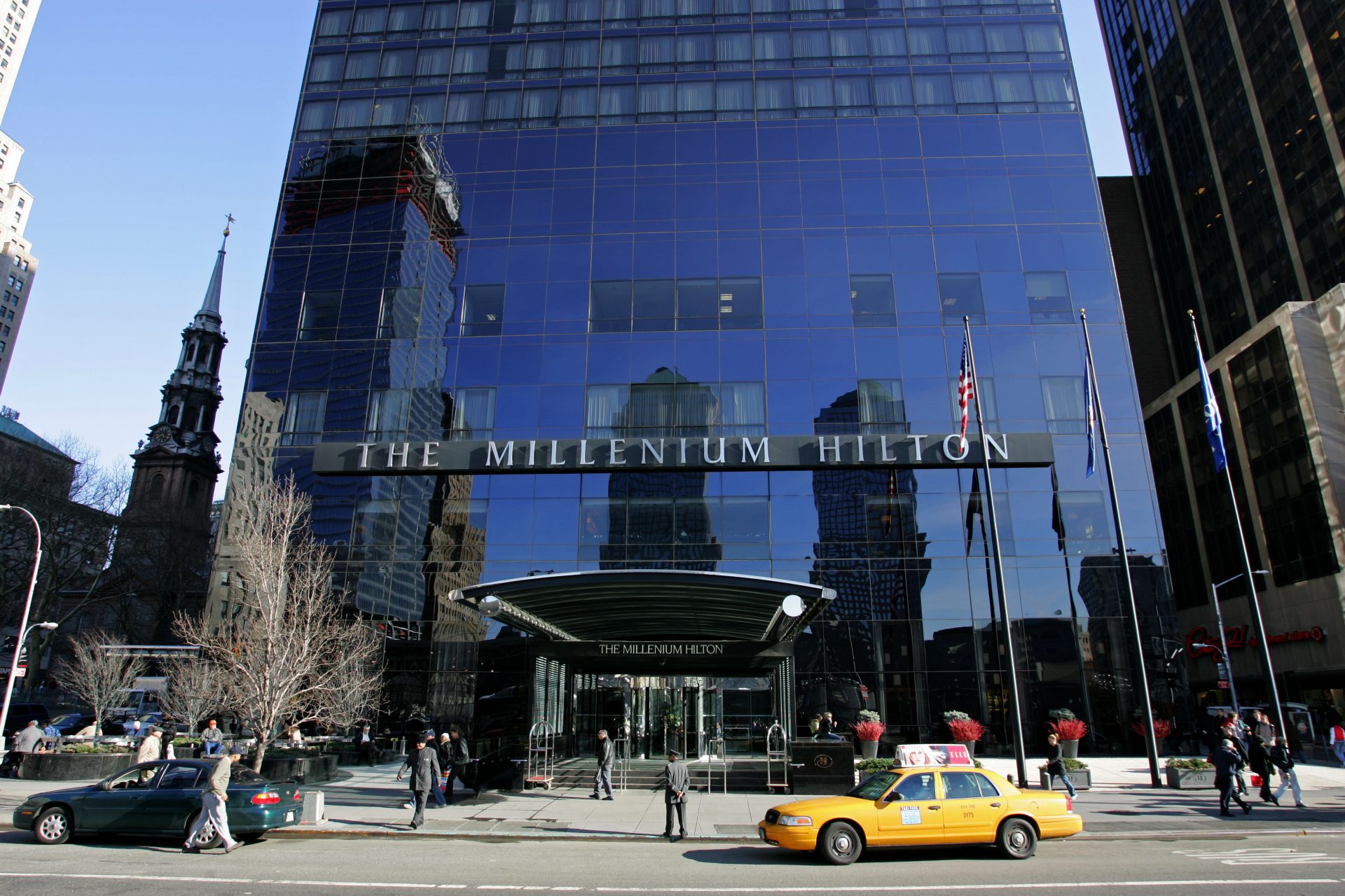 Ground Zero building work reflected in the glass walls of the Millenium